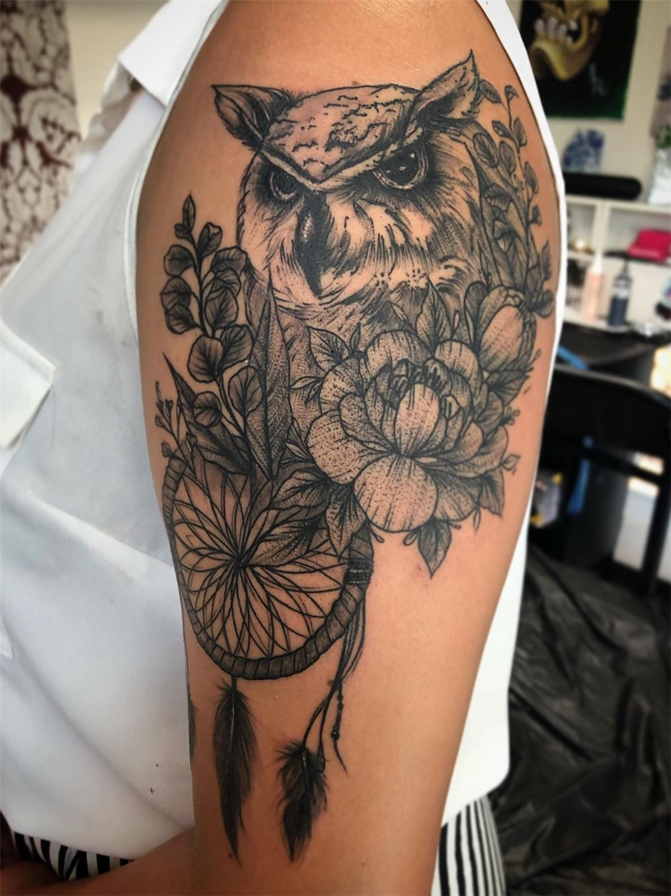 Owl tattoo on forearm by Zak Schulte